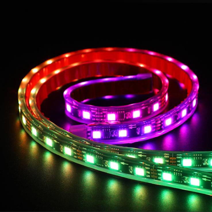 Underglow multi-color RGB LED extension strips coiled on a black background