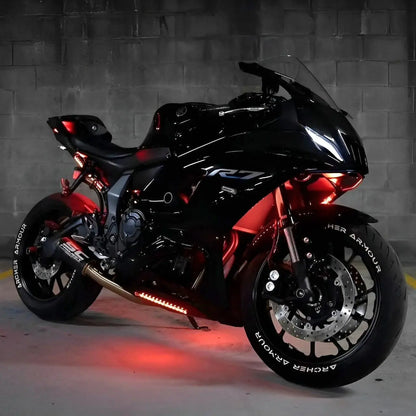 Black sport motorcycle with Underglow red LED lighting kits on wheels and chassis.