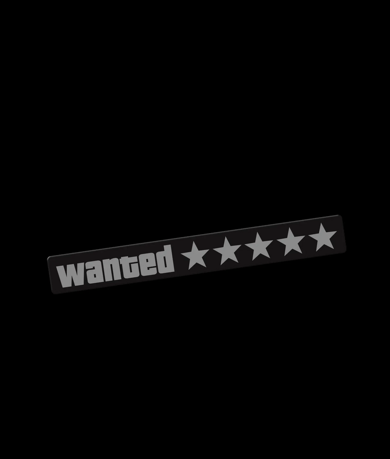 Underglow Wanted LED decal featuring white text and five stars on a black background